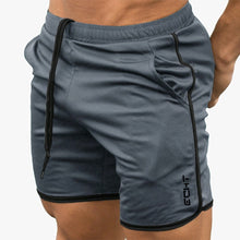 Cargar imagen en el visor de la galería, Nuevos pantalones cortos de culturismo para hombre, ropa deportiva de secado rápido de malla transpirable para entrenamiento de verano para hombre, pantalones cortos de playa para correr
