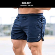 Cargar imagen en el visor de la galería, Nuevos pantalones cortos de culturismo para hombre, ropa deportiva de secado rápido de malla transpirable para entrenamiento de verano para hombre, pantalones cortos de playa para correr