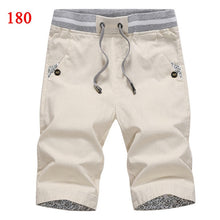 Cargar imagen en el visor de la galería, Envío de la gota 2021 verano sólido pantalones cortos casuales hombres cargo pantalones cortos de talla grande 4XL pantalones cortos de playa M-4XL AYG36