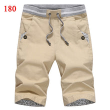 Cargar imagen en el visor de la galería, Envío de la gota 2021 verano sólido pantalones cortos casuales hombres cargo pantalones cortos de talla grande 4XL pantalones cortos de playa M-4XL AYG36